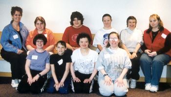 Team picture of 8 athletes, and two coaches