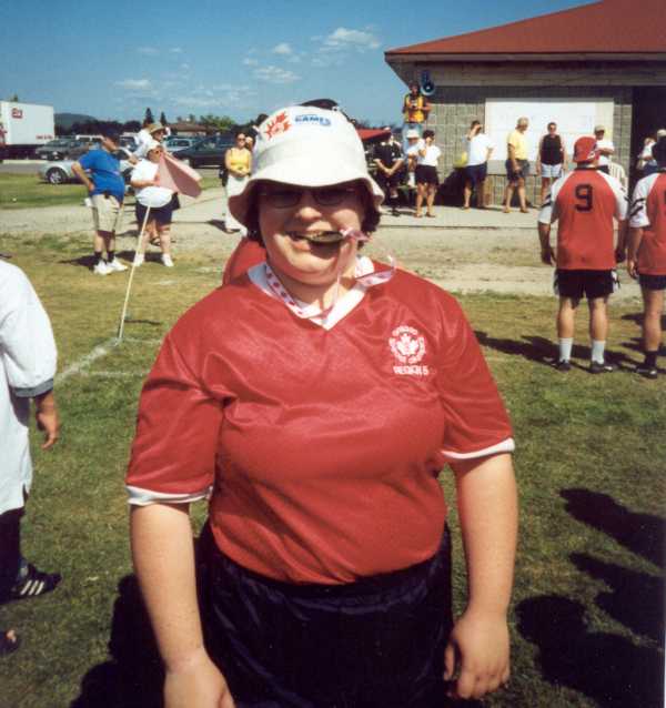 One Athlete taking a bite out of her medal!, 2001